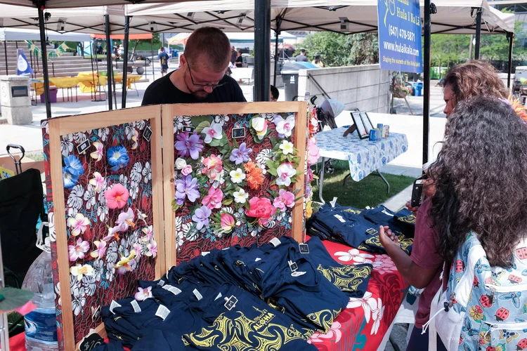 Maker selling lei crafts and AlohaFest apparel
